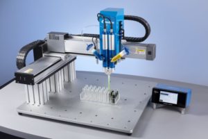 2K 797PCP Pump Filling into Vial with Controller HR New 797PCP Pump Systems for Continuous Volumetric Dispensing of 1K and 2K fluids