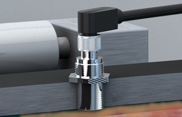 “Yes we can” check cans inside a box using Contrinex long-range analogue inductives