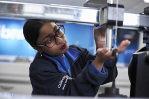 Fowzyia Ahmed Kickstart Laboratory Assistant operating the torque calibration rig in the new Calibration Select Laboratory Half a million pound laboratory brings job creation to Smethwick in Birmingham